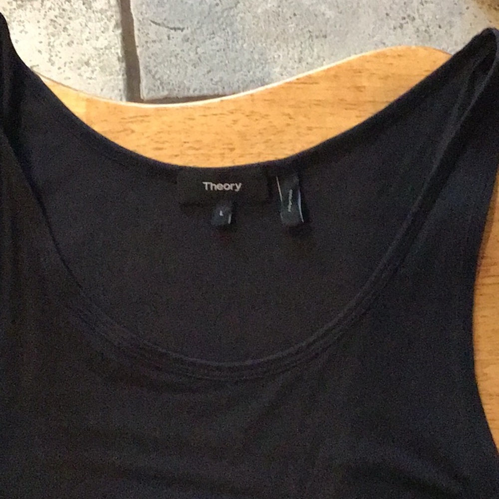 Theory     2 perfect condition black tank tops. Two of the same kind identical